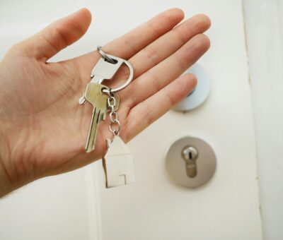 A realtor with key in hand